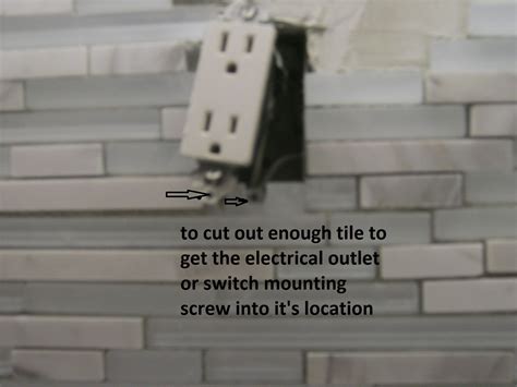 tiling around electrical outlet